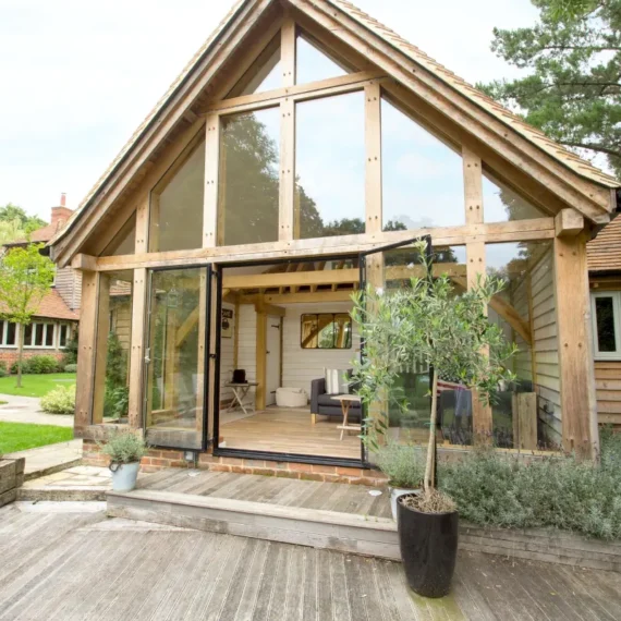 Bespoke oak-framed garden annexe by oakcraft, showcasing elegant design and natural light.