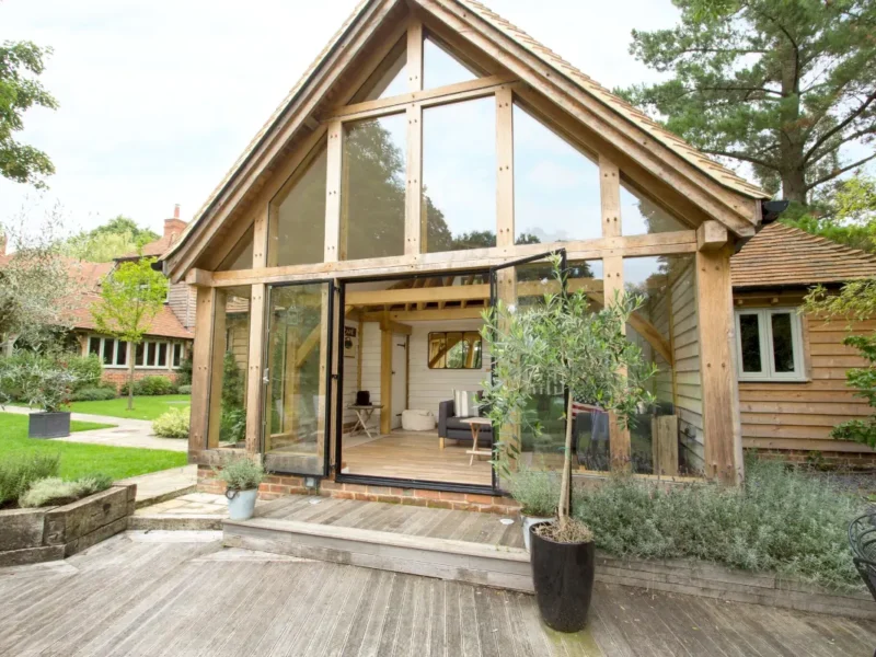 Bespoke oak-framed garden annexe by OakCraft, showcasing elegant design and natural light.