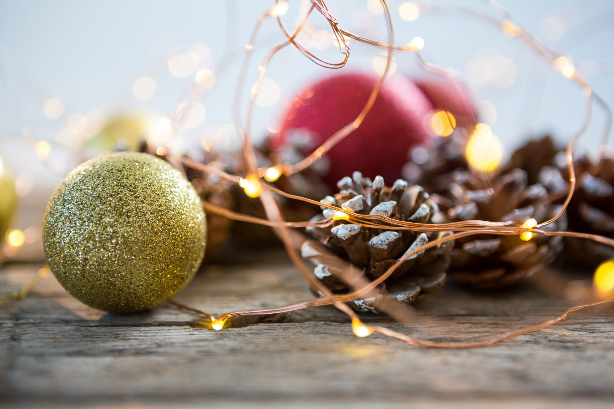 Christmas bauble ball on wooden plank